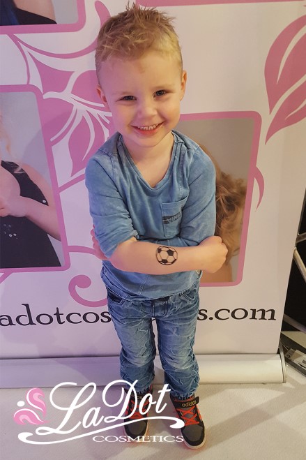 little boy with a tattoo
