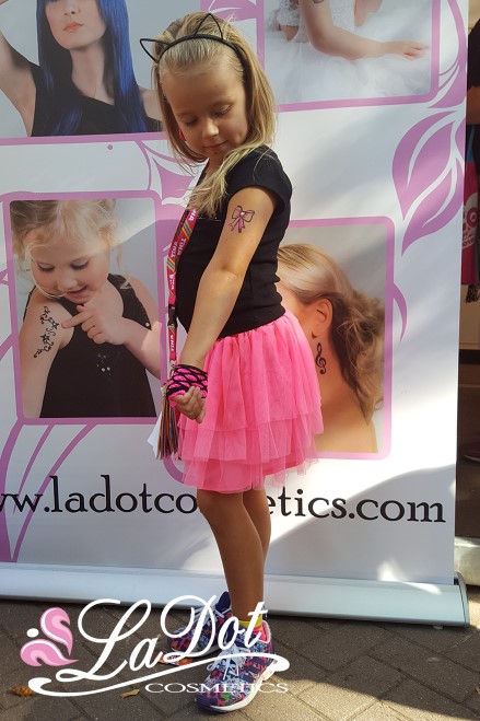 little girl with a nice temporary tattoo
